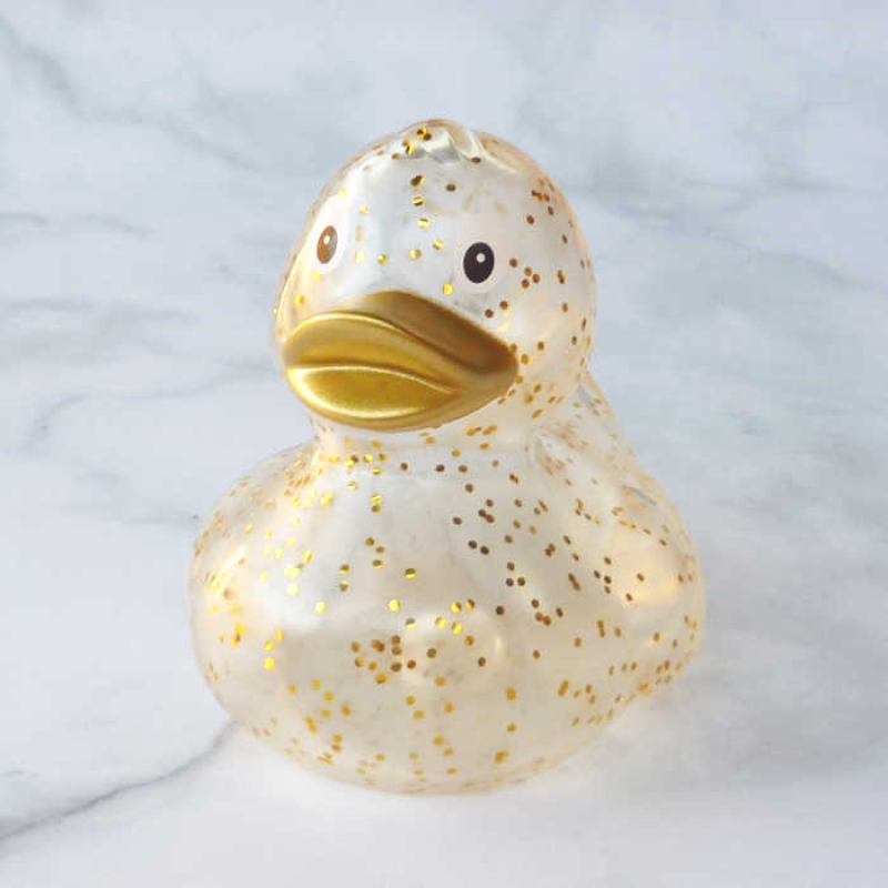 Glamouröse goldglitzernde Badeente Quietscheente