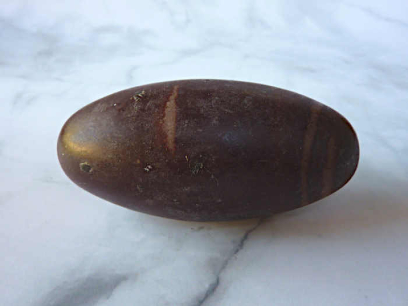 Shiva Lingam heiliger Stein Indien