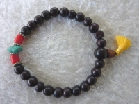 Handmala / Tikra aus Rosenholz